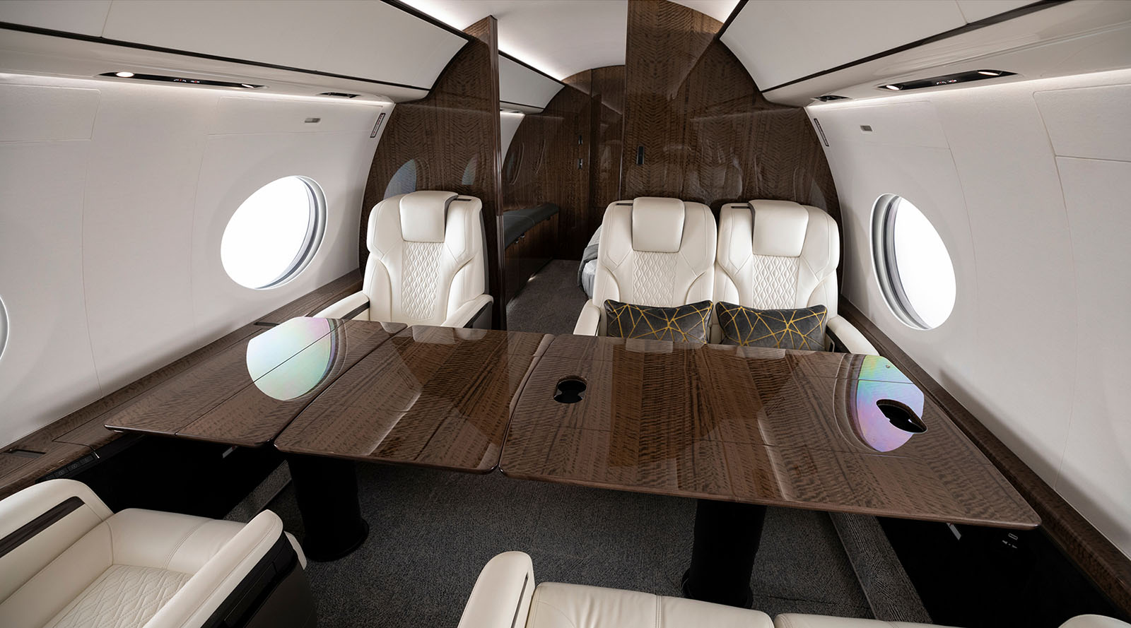 Conference table with six leather seats in a private airplane