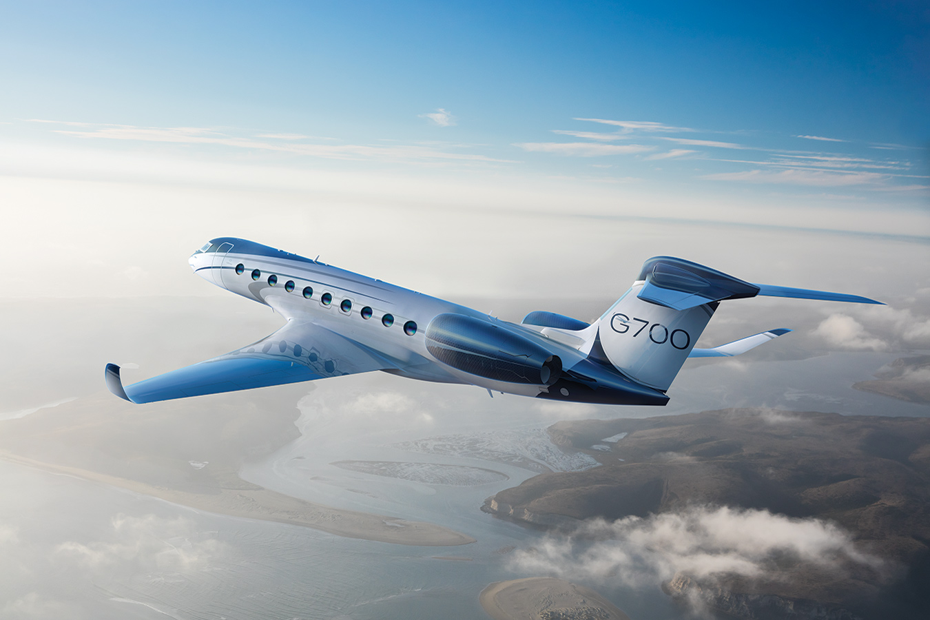 G700 flying over the mouth of a river